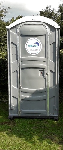 view of portable toilet unit on construction site